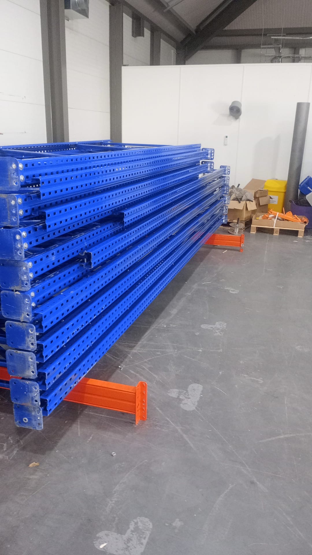 Used Pallet Racking Newport Wales - Blue uprights ready for install | UM Storage Systems