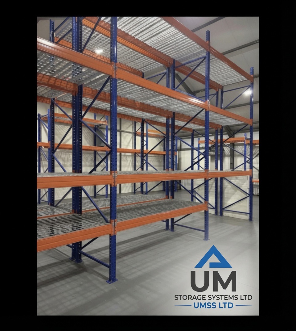 Used Pallet Racking Newport Wales - Completed installation with blue uprights and orange beams | UM Storage Systems